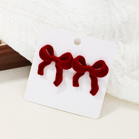 1 Pair Simple Style Bow Knot Plastic Ear Studs