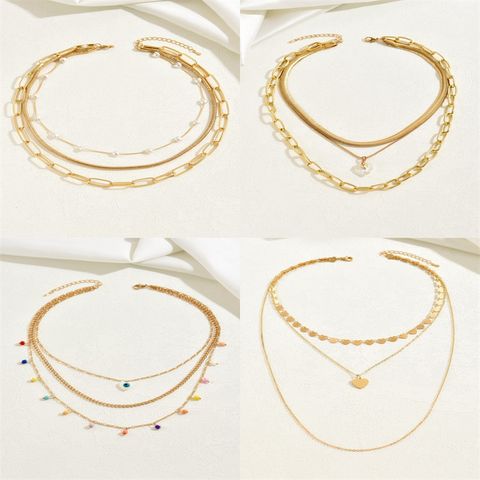Simple Style Heart Shape Alloy Plating Gold Plated Women's Layered Necklaces