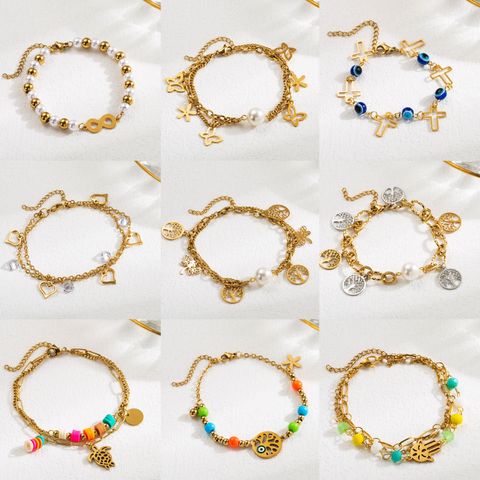 Simple Style Geometric Stainless Steel Enamel Plating Inlay Artificial Pearls Zircon Ceramic Plate 18k Gold Plated Bracelets