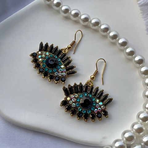 Vintage Style Simple Style Roman Style Eye Alloy Inlay Artificial Gemstones Gold Plated Women's Drop Earrings
