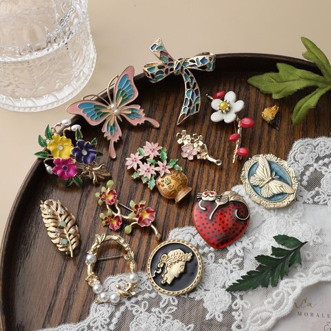 Retro Flower Bow Knot Alloy Enamel Inlay Artificial Gemstones Women's Brooches