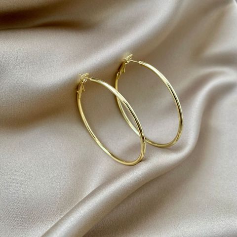 Wholesale Jewelry 1 Pair Exaggerated Circle Alloy Gold Plated Silver Plated Hoop Earrings