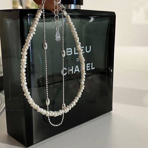 Elegant Round Sterling Silver Layered Pearl Bracelets