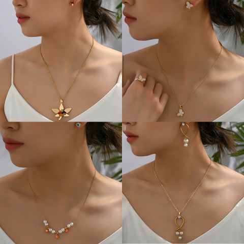 201 Stainless Steel Alloy 18K Gold Plated Elegant Simple Style Inlay Maple Leaf Eye Butterfly Artificial Pearls Rhinestones Earrings Necklace