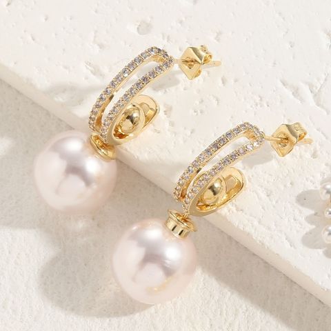 1 Pair Elegant Luxurious Queen C Shape Plating Inlay Copper Artificial Pearls Zircon 14k Gold Plated Drop Earrings Ear Studs