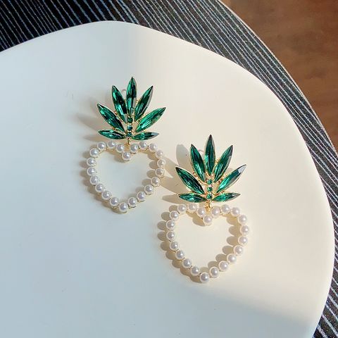 Vacation Modern Style Artistic Fruit Heart Shape Pineapple Alloy Beaded Hollow Out Inlay Artificial Crystal Artificial Pearls Women's Ear Studs