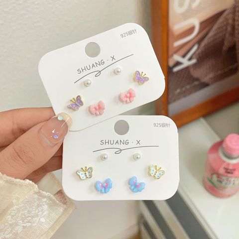 Sweet Butterfly Bow Knot Alloy Inlay Artificial Pearls Women's Ear Studs