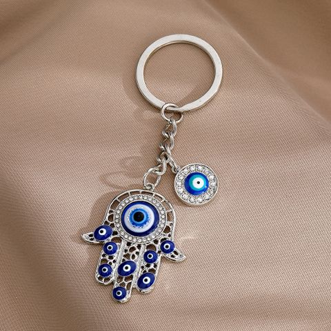 Artistic Devil's Eye Palm Alloy Inlay Artificial Diamond Bag Pendant Keychain