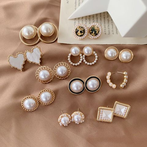 Lady Round Artificial Pearl Alloy Plating Inlay Artificial Gemstones Women's Ear Studs