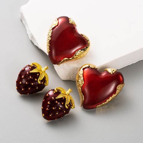 Elegant Heart Shape Alloy Resin Inlay Resin Rhinestones Gold Plated Women's Earrings Ear Studs