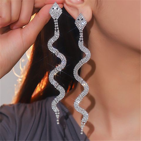 Estilo Simple Serpiente Diamante De Imitación Enchapado Plateado Mujeres Pendientes De Gota