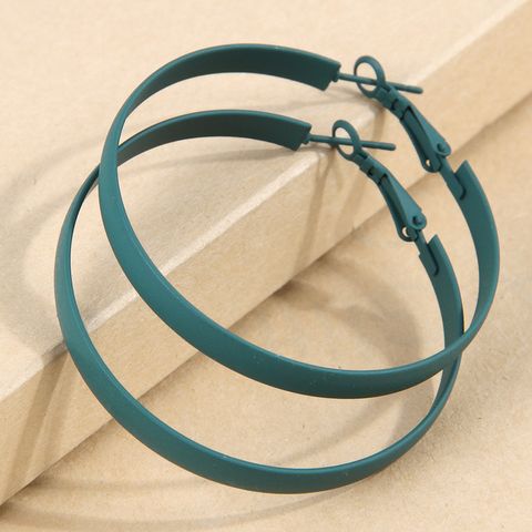 Simple Style Solid Color Ferroalloy Women's Hoop Earrings