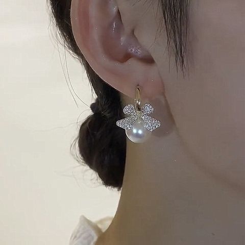Elegant Bow Knot Alloy Inlay Artificial Pearls Artificial Diamond Women's Earrings