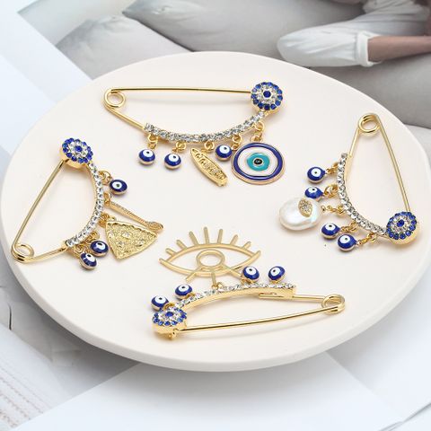 Simple Style Devil's Eye Star Heart Shape Alloy Inlay Artificial Gemstones Women's Brooches