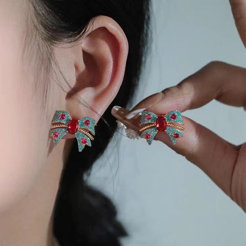 Sweet Bow Knot Alloy Inlay Artificial Crystal Women's Ear Studs