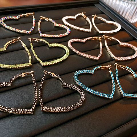 Exagerado Estilo Simple Forma De Corazón Aleación Enchapado Embutido Diamantes De Imitación Mujeres Aretes