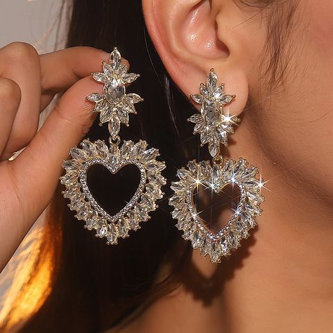 1 Pair Exaggerated Shiny Heart Shape Plating Hollow Out Inlay Alloy Artificial Diamond Drop Earrings