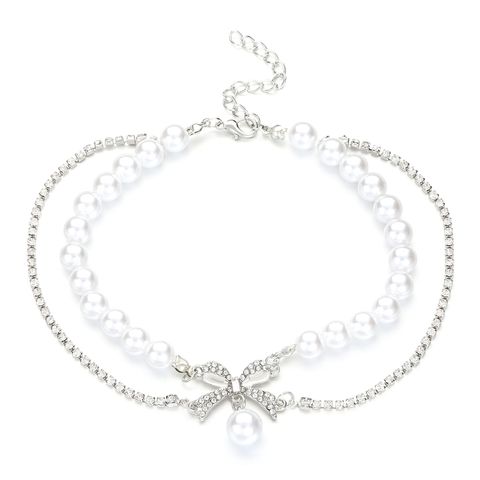 Fairy Style Bow Knot Artificial Diamond Artificial Pearl Alloy Wholesale Pendant Necklace