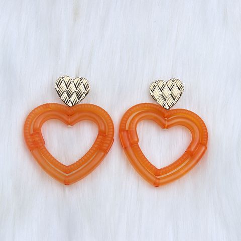 1 Pair Simple Style Heart Shape Spray Paint Hollow Out Arylic Drop Earrings