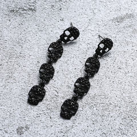 1 Pair Simple Style Skull Hollow Out Alloy Drop Earrings