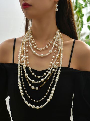 Simple Style Round Alloy Plastic Wholesale Layered Necklaces