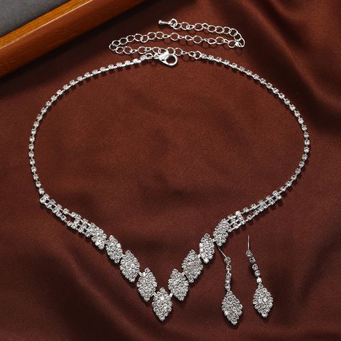 Elegante Boda Nupcial Rombo Aleación Embutido Diamantes De Imitación Mujeres Aretes Collar