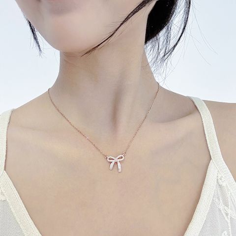 Simple Style Bow Knot Titanium Steel Inlay Zircon Pendant Necklace