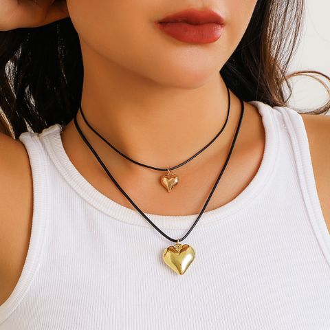 Simple Style Heart Shape Alloy Leather Wax Line Layered Three-dimensional Women's Pendant Necklace