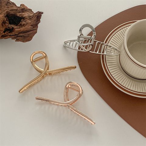 Simple Style Solid Color Metal Hair Claws