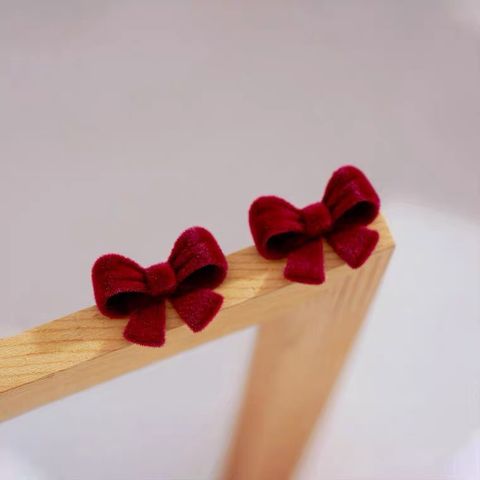 1 Pair Sweet Bow Knot Alloy Flocking Ear Studs