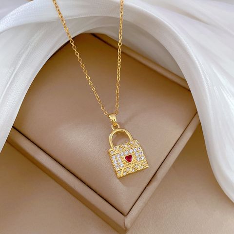 Wholesale Classic Style Streetwear Heart Shape Lock Titanium Steel Copper Inlay Artificial Gemstones Pendant Necklace
