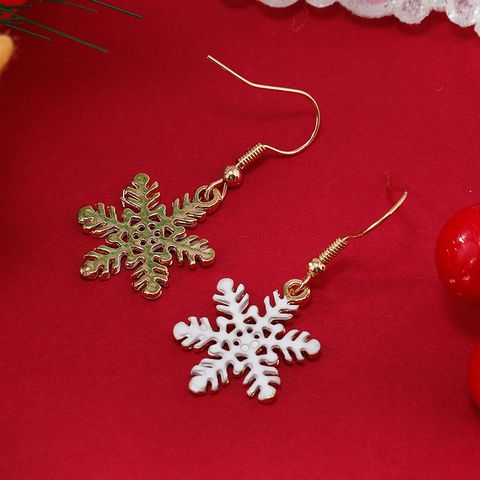 1 Pair Cute Snowflake Enamel Hollow Out Alloy Gold Plated Drop Earrings