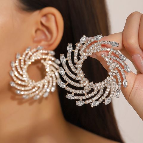 1 Pair Glam Spiral Stripe Inlay Alloy Artificial Crystal Ear Studs