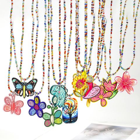 Vintage-stil Pastoral Blume Schmetterling Kunststoff Perlen Frau Halskette Mit Anhänger