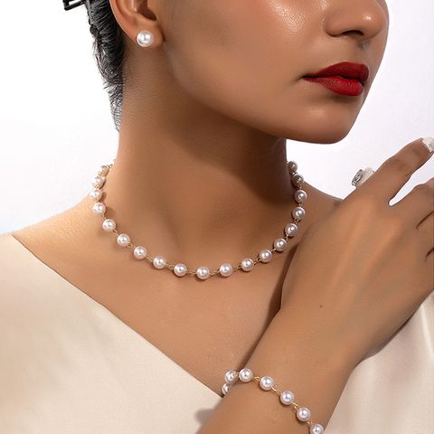 Elegant Ferien Klassischer Stil Perle Legierung Kunststoff Überzug 14 Karat Vergoldet Frau Armbänder Ohrringe Halskette