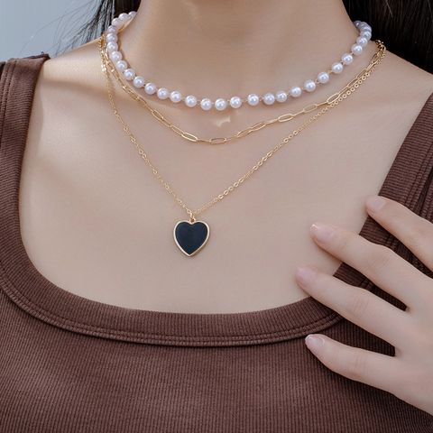 Elegant Heart Shape Plastic Zinc Alloy Women's Pendant Necklace