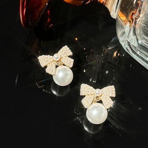 1 Pair Elegant Glam Bow Knot Inlay Alloy Artificial Pearls Drop Earrings