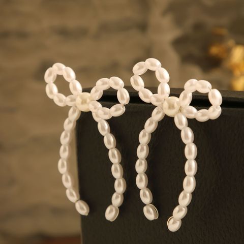 1 Pair Elegant Bow Knot Beaded Plating Artificial Pearl Alloy Ear Studs