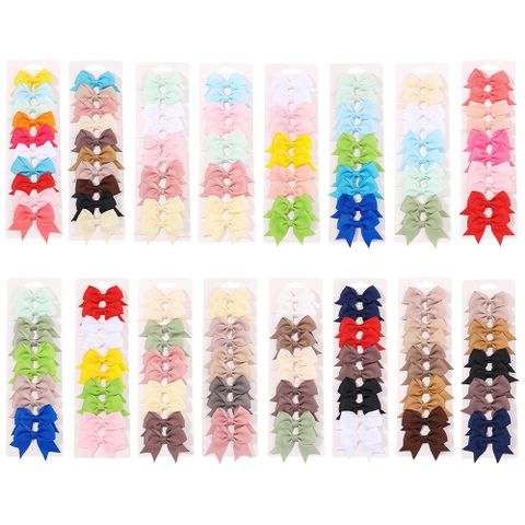 Girl'S IG Style Sweet Solid Color Bow Knot Polyester Ribbed Band Pleated Hair Clip