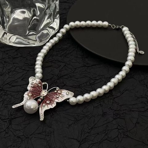 Sweet Cool Style Butterfly Imitation Pearl Alloy Plush Enamel Inlay Artificial Diamond Women's Necklace