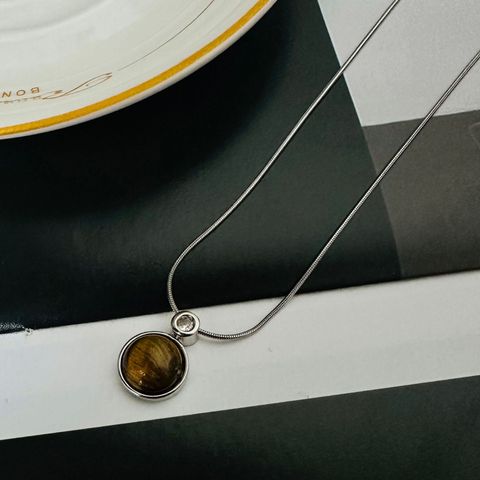 Tiger Eye Titanium Steel Copper IG Style Simple Style Round Plating Inlay Tiger Eye Pendant Necklace