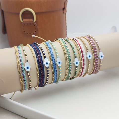 IG Style Casual Retro Devil's Eye Palm Polyester Cotton Seed Bead Copper Beaded Knitting Women's Bracelets