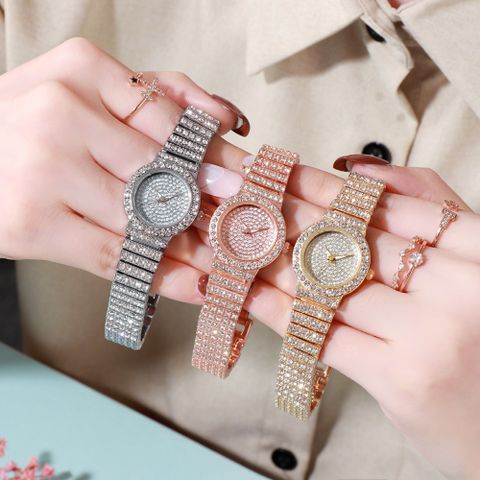 Simple Style Shiny Solid Color Horseshoe Buckle Quartz Women's Watches