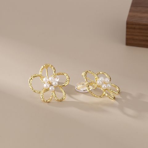 Simple Style Flower Alloy Plating Hollow Out Inlay Pearl Women's Ear Cuffs Ear Studs 1 Pair