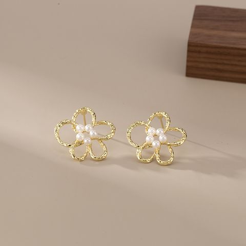 Simple Style Flower Alloy Plating Hollow Out Inlay Pearl Women's Ear Cuffs Ear Studs 1 Pair