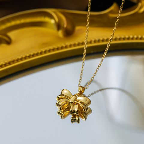 Titan Stahl Kupfer Vergoldet Einfacher Stil Bogenknoten Halskette Mit Anhänger