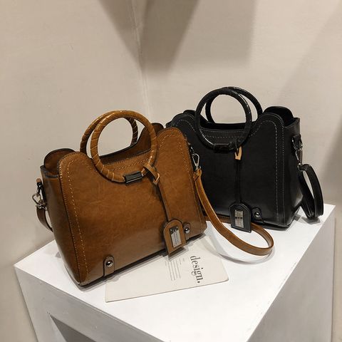 Women's Large Pu Leather Solid Color Vintage Style Zipper Handbag