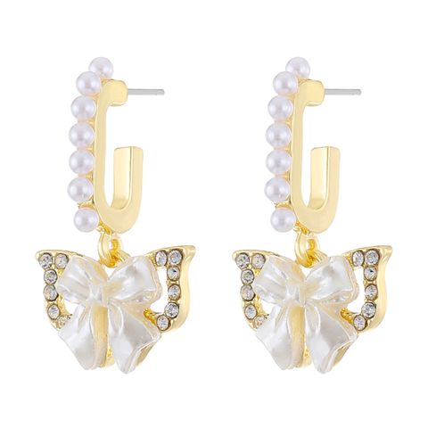 1 Pair Simple Style Classic Style Bow Knot Inlay Alloy Rhinestones Drop Earrings
