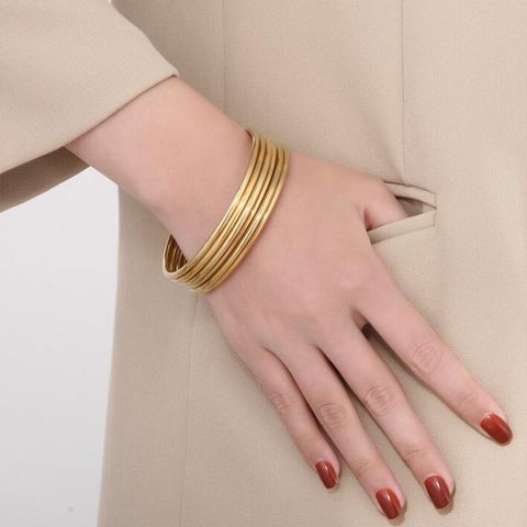 304 Stainless Steel 18K Gold Plated Simple Style Round Solid Color Bangle