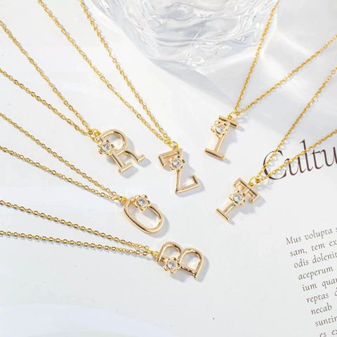 Wholesale Simple Style Streetwear Letter Flower Copper Inlay K Gold Plated Zircon Pendant Necklace